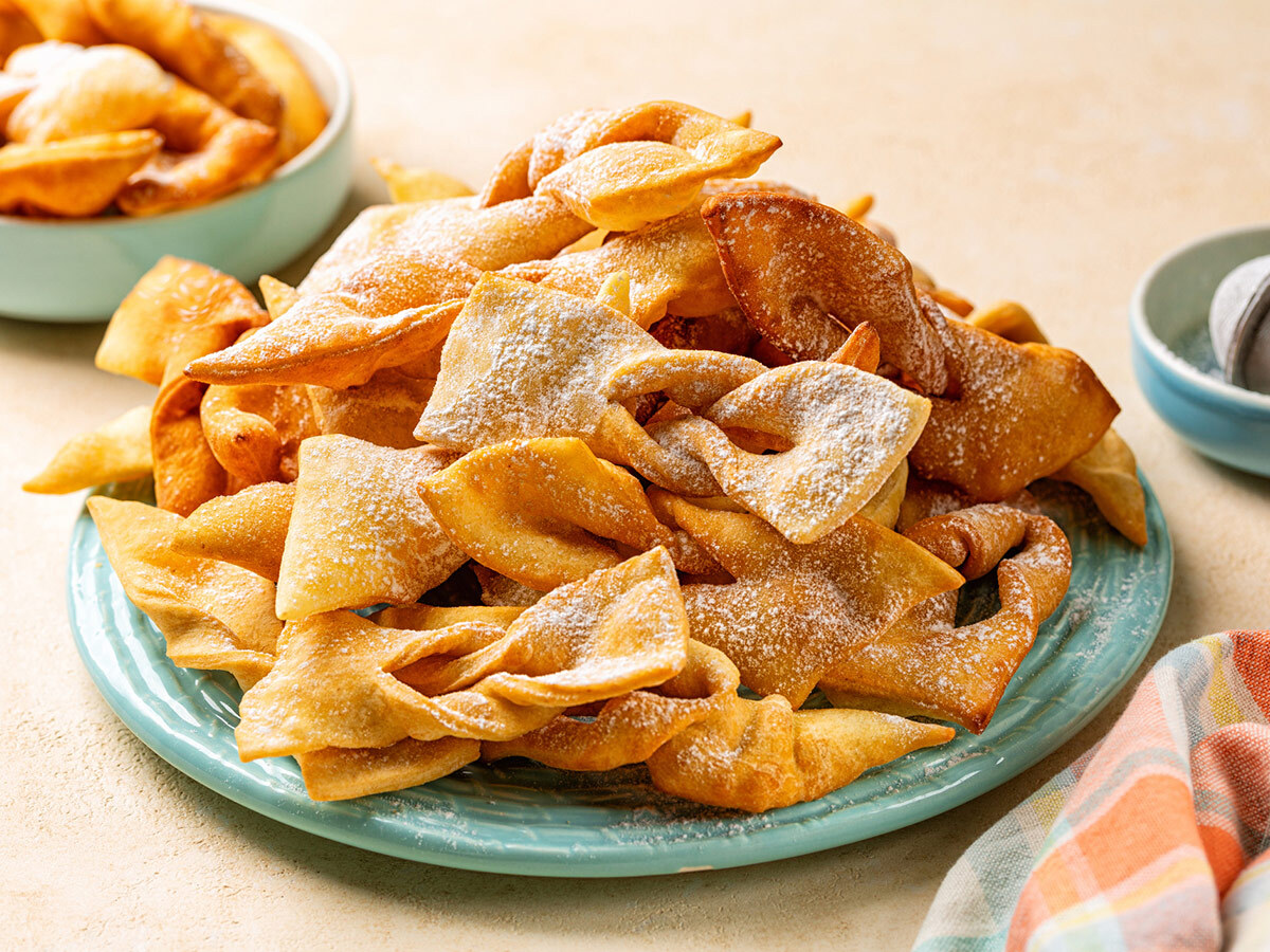 Fattigmann, Norwegian fried diamond-cut cookies dusted with confectioners sugar