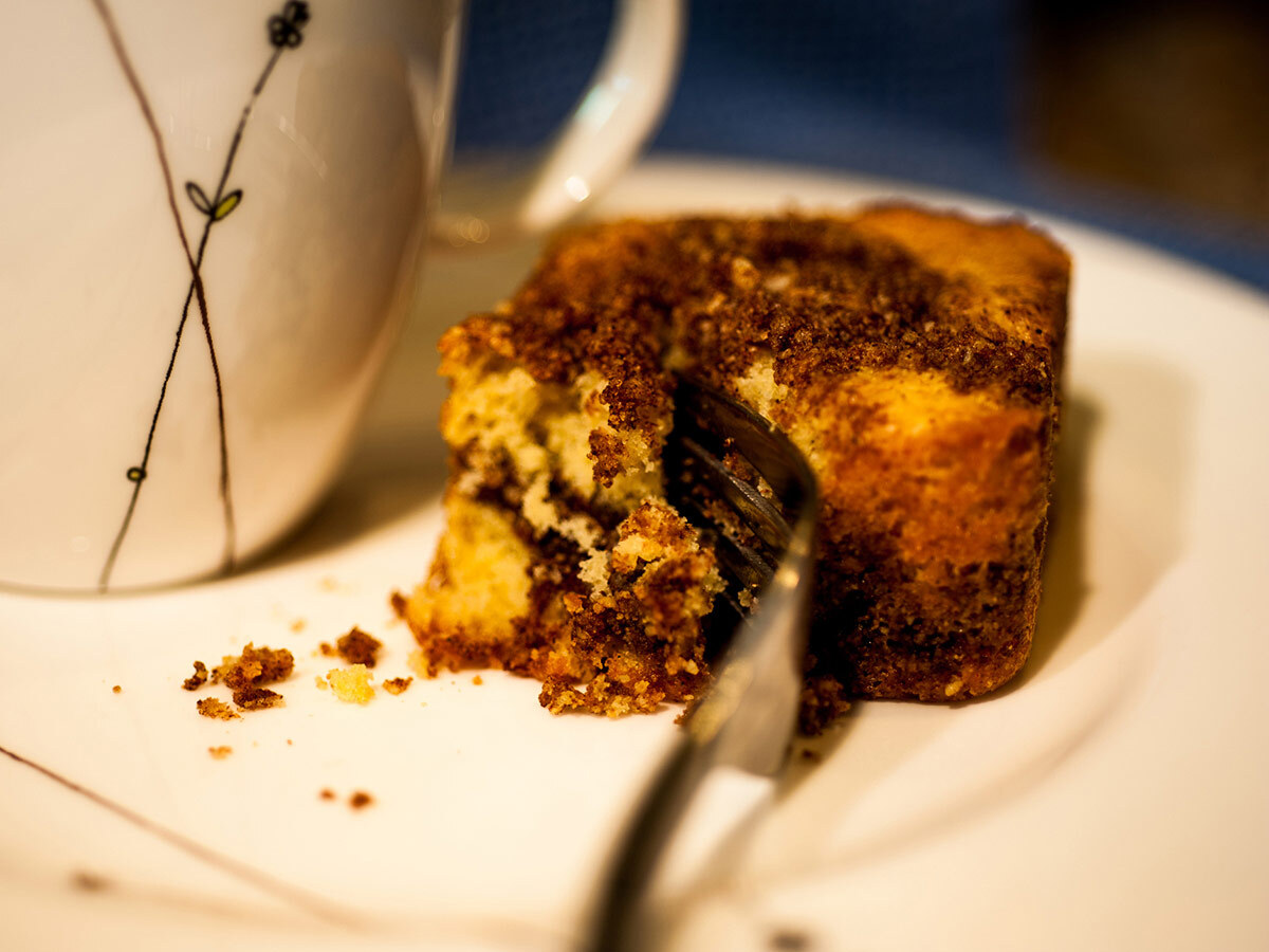 Swedish coffee cake with cinnamon crumb topping, served for fika with coffee